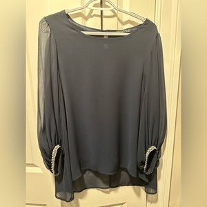 Navy blouse with sequin cuff details